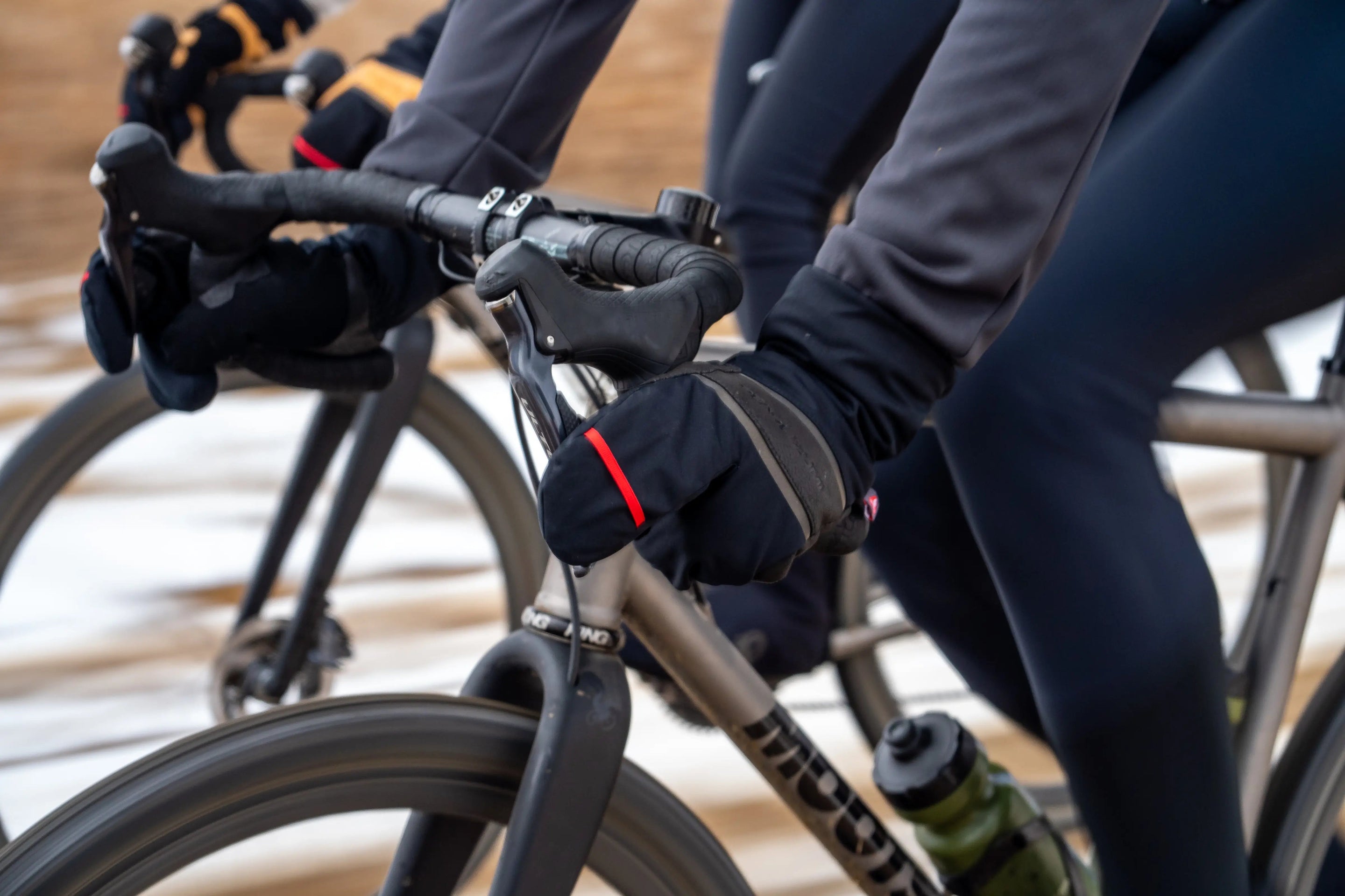 cyclist riding in Pearl Izumi AmFIB Lobster Gloves